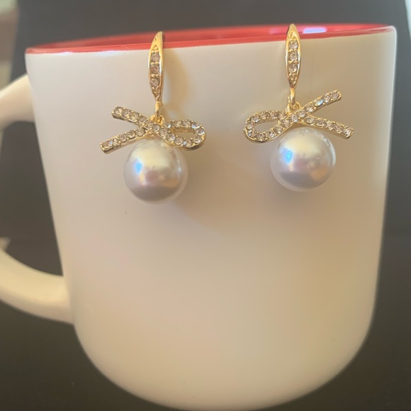 Shashi 18K Gold Plated Pearl Drop
Earrings with Pave Ribbon Bow, NWT - Picture 2 of 3